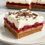 Layered Chocolate Cherry Lush with cherry, chocolate, and cream cheese.